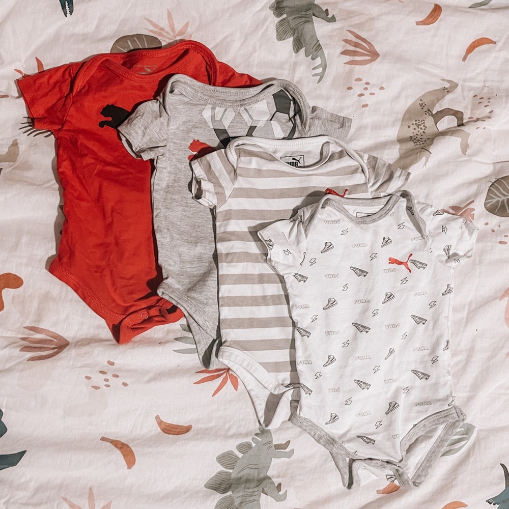 4 piece pack Puma 0-3 month onesies